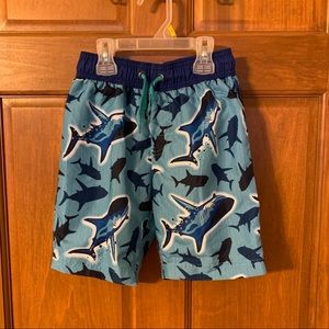 Boys blue shark swim trunks